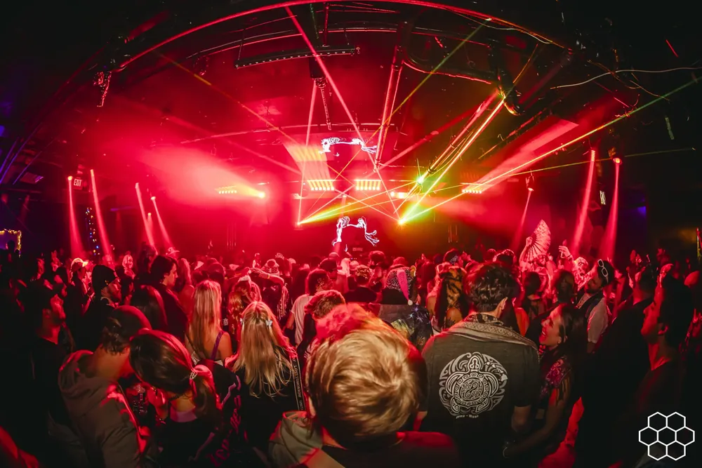Crowd under red lasers