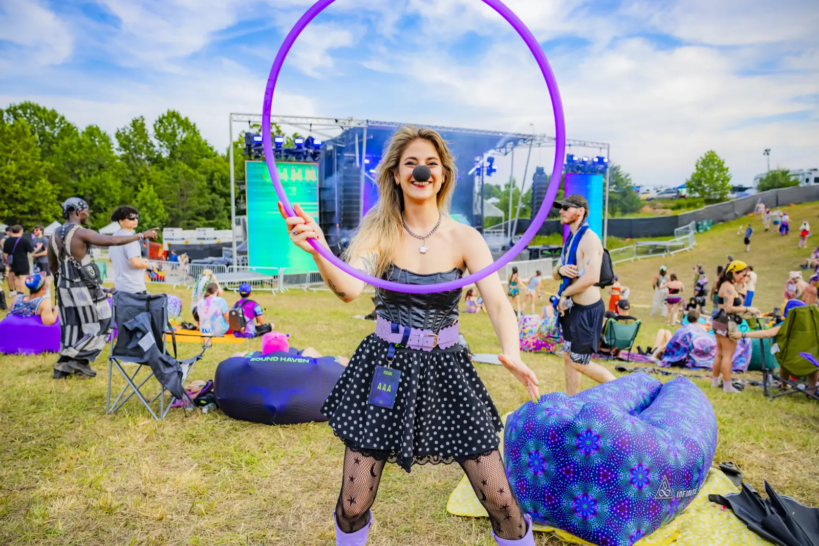 A hooper in front of the stage in daylight at Sound Haven
